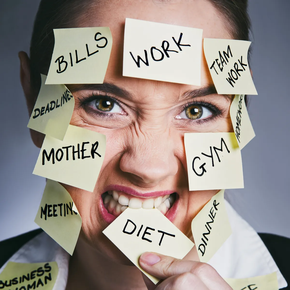stressed woman sticky notes