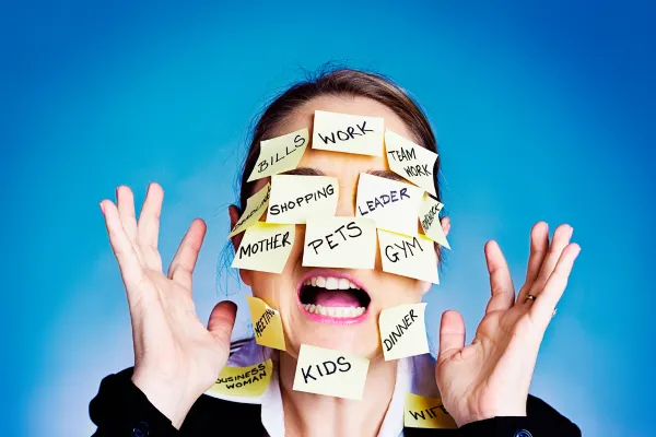 stressed woman sticky notes
