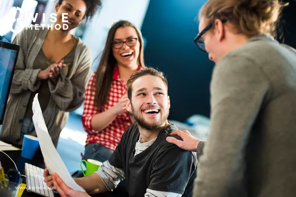 Group of people in a meeting room at a team building event