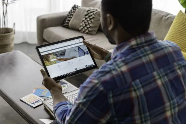 Man looking at tablet