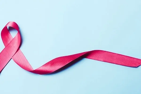 Pink breast cancer awareness ribbon symbolizing prevention and awareness