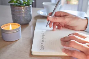 Women writing in a journal