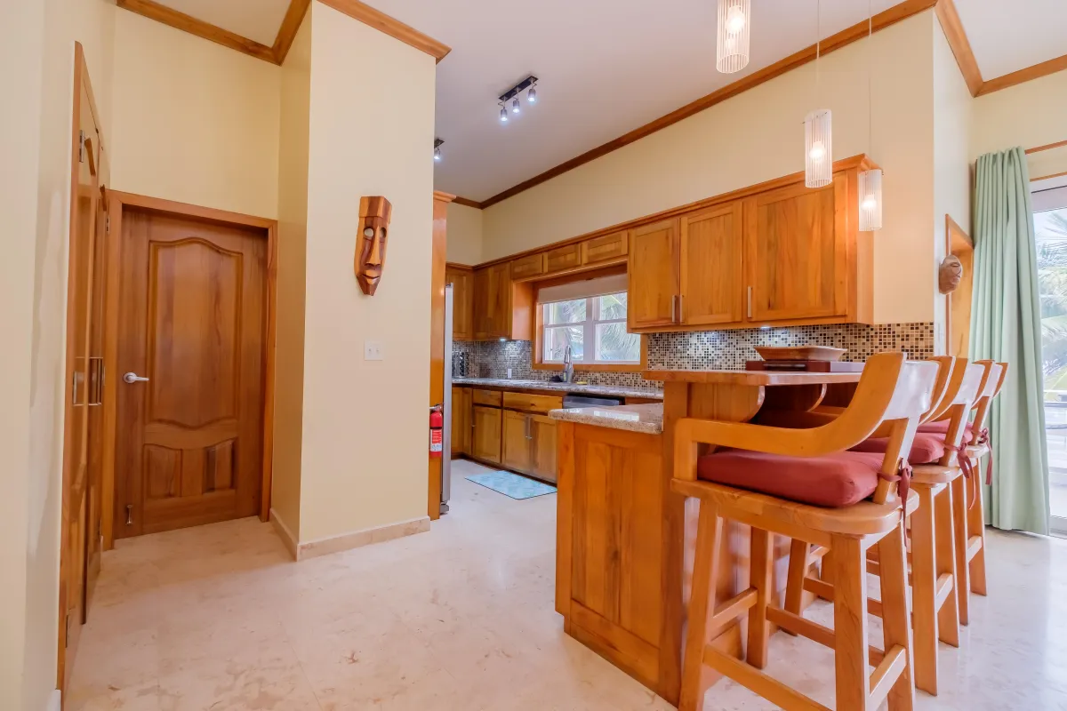 Fully Equipped Kitchen with Bar and Seating in Ambergris Caye Belize Vacation Rental