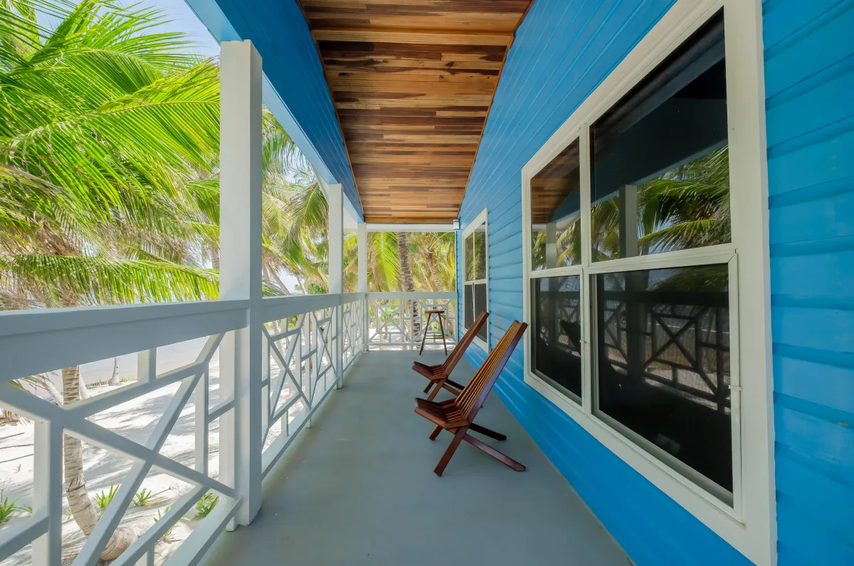 Ambergris Caye Vacation Rental with Balcony with chairs and views of the beach