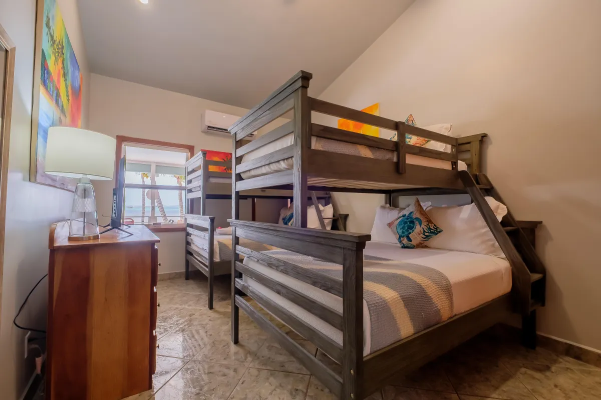 Vacation Rental with Bunkroom with 2 sets of bunkbeds with views of Ambergris Caye Beach