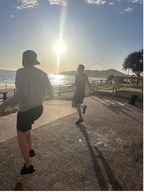 Men doing jumping ropes