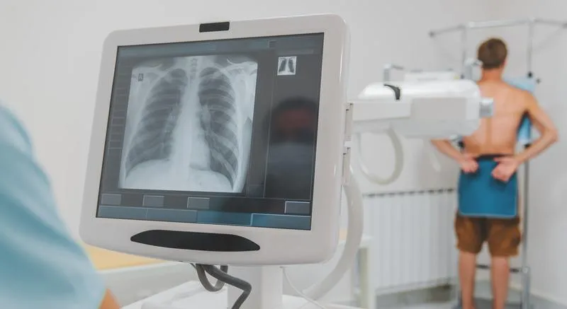 patient undergoes X-ray testing for diagnosis