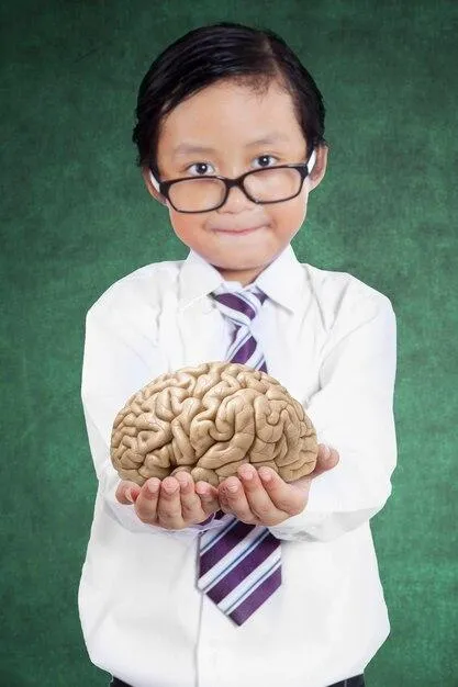 boy holding brain