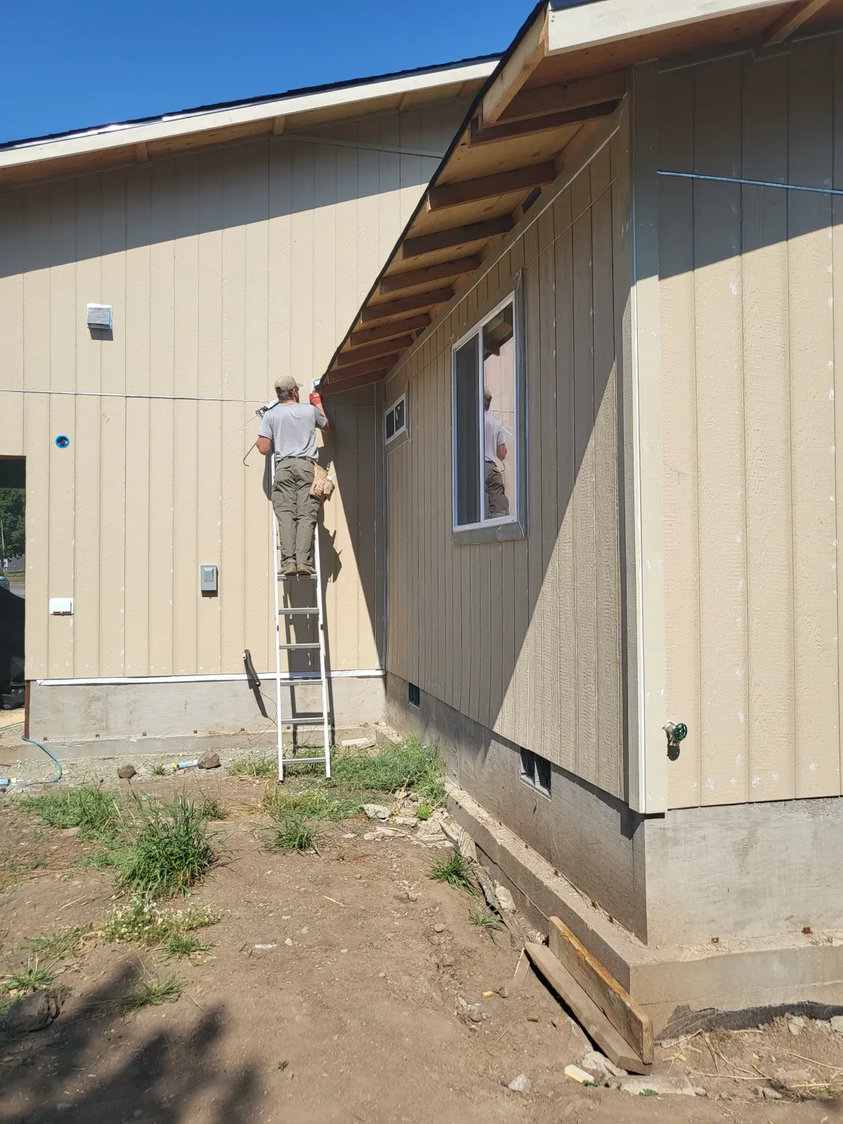 Exterior house painting with siding work by Parker Built Construction in Oregon