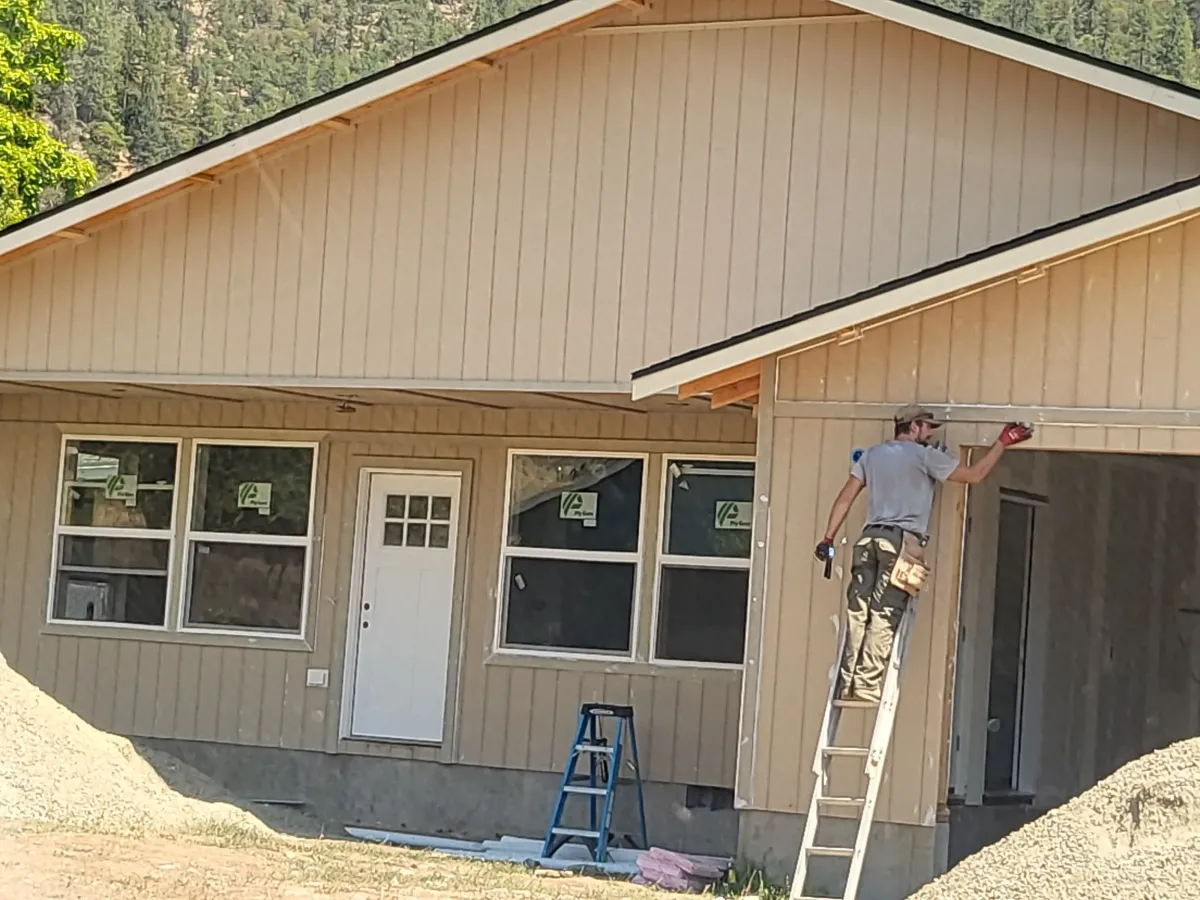 Exterior siding painting and trim work by Parker Built Construction on a newly built home in Oregon