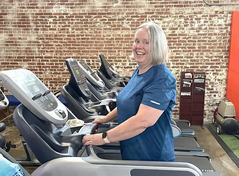 women on treadmill in gym