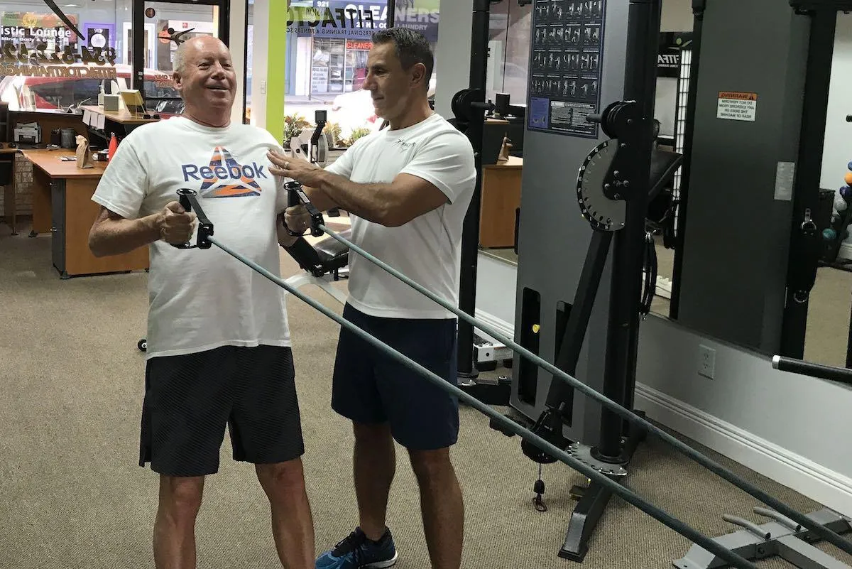 man exercising in gym 