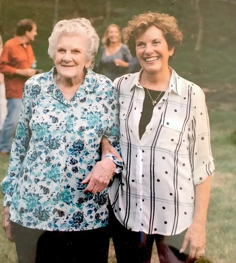 two women outside walking longevity