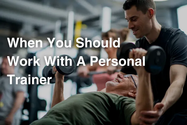 When You Should Work With A Personal Trainer - man working with a personal trainer