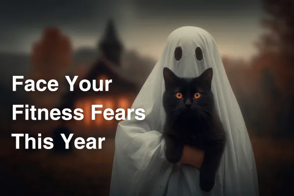 halloween photo of ghost holding a cat title: face your fitness fears this year