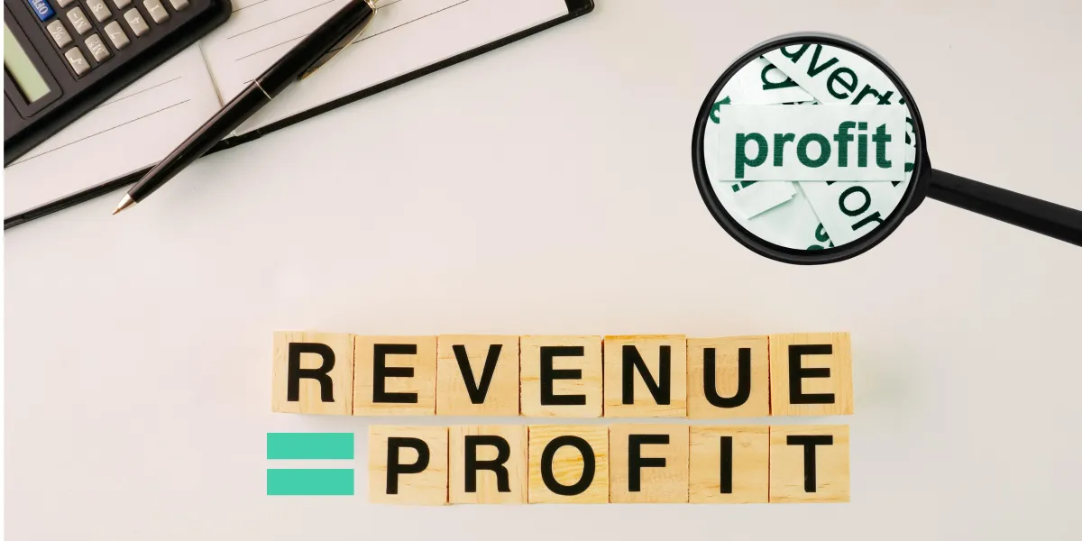 Scrabble letters spelling out Revenue = Profit