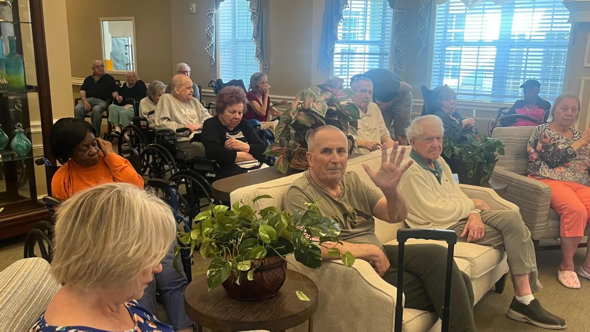 Gulf Coast Memory Care Senior Waving