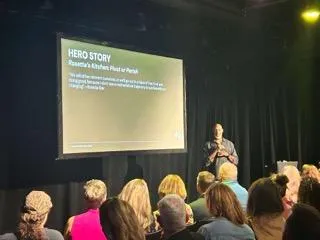 Reggie Tidwell speaking at the Asheville Business Summit