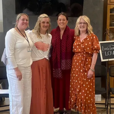 Single mothers pose at the Bravehearts Retreat.