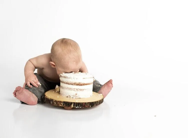 child eating cake