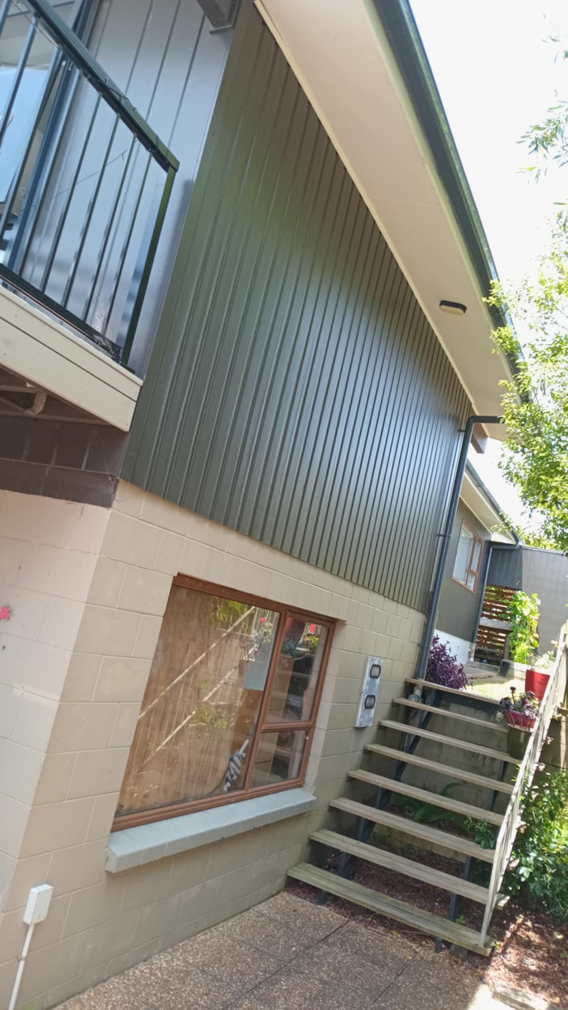 Exterior house painting in progress on two storey weatherboard home Far North NZ