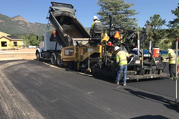 Milestone Restoration Team working on the road