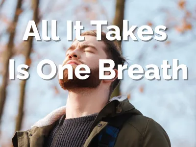 Man with eyes closed taking a deep, intentional breath outdoors with text overlay reading 'All It Takes Is One Breath' - demonstrating the centering technique from the CALM Method for camera confidence