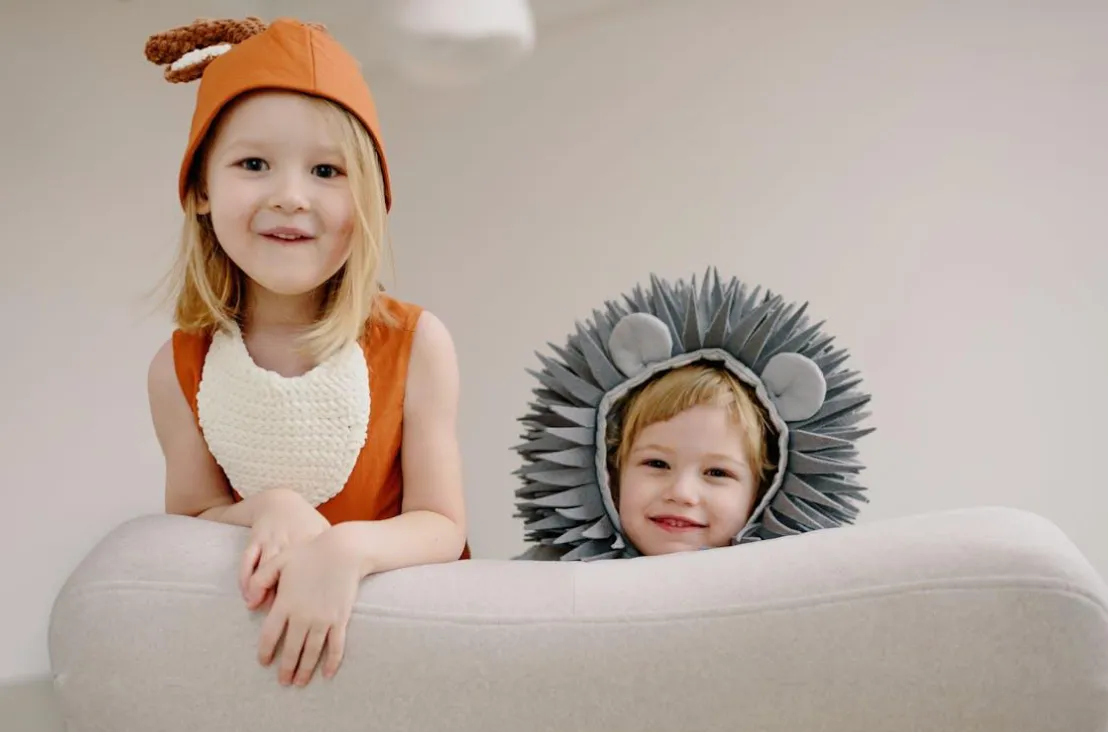 two kids posing for a picture.