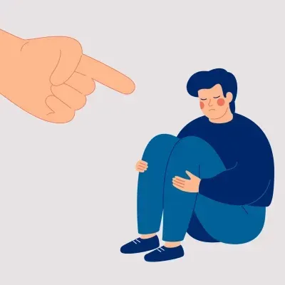 Sad man being pointed at