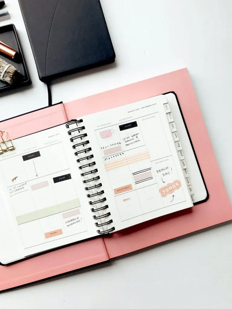 planner and schedules on a desk
