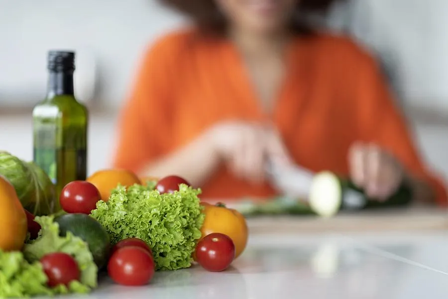 Image of an unkown woman nourishing her body with healthy food.
