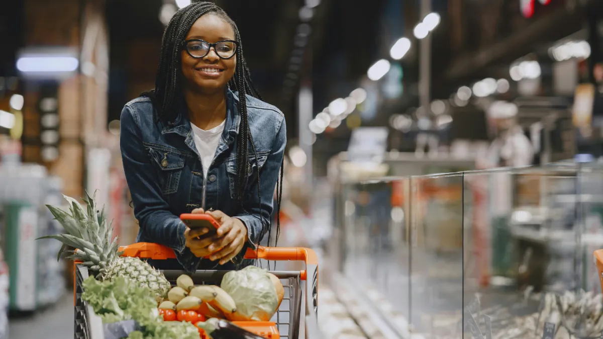 A woman of colour on a Healthy Grocery Shopping: Smart Ways to Skip Processed Foods