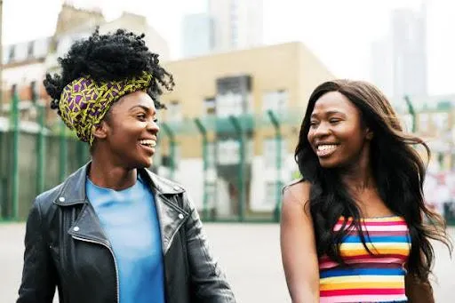 Friends building healthy relationship  laughing together - stock photo