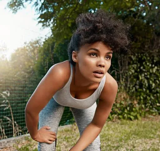 Shot of a sporty young woman taking a break after her run, demonstrating her Inner Strength Mantras