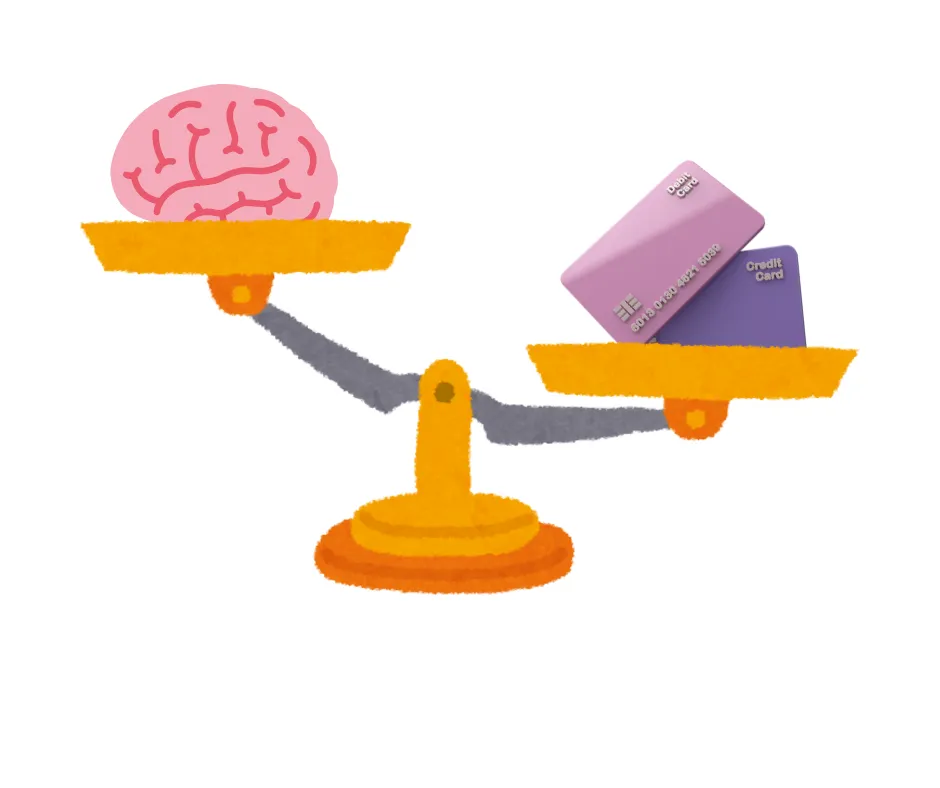 Scales balancing credit cards on one side and a brain on the other, symbolizing the balance between financial decisions and emotions.