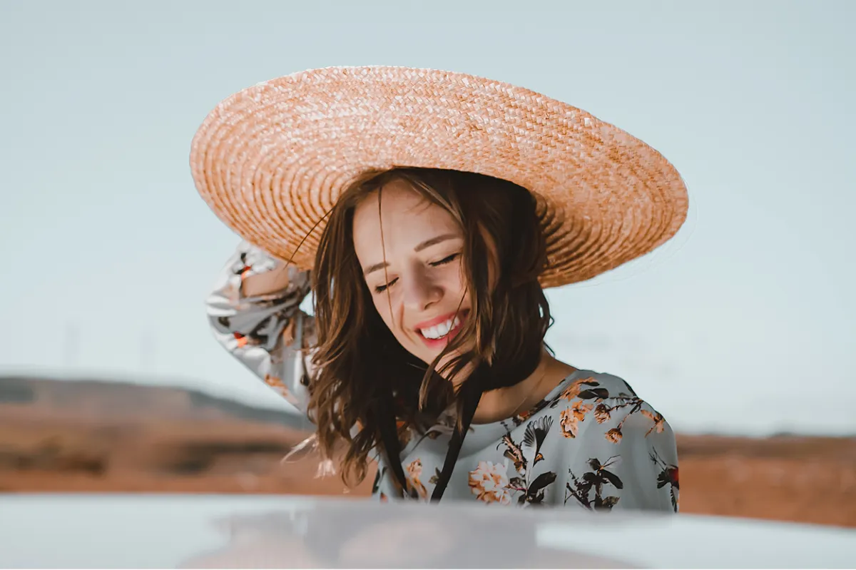 women with hat on 