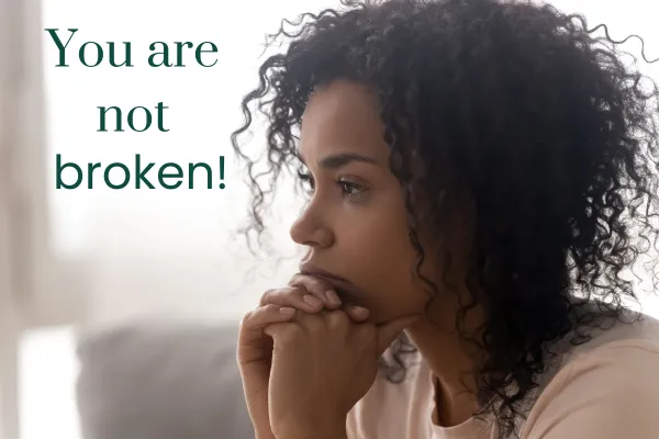 Woman in cafe working on laptop