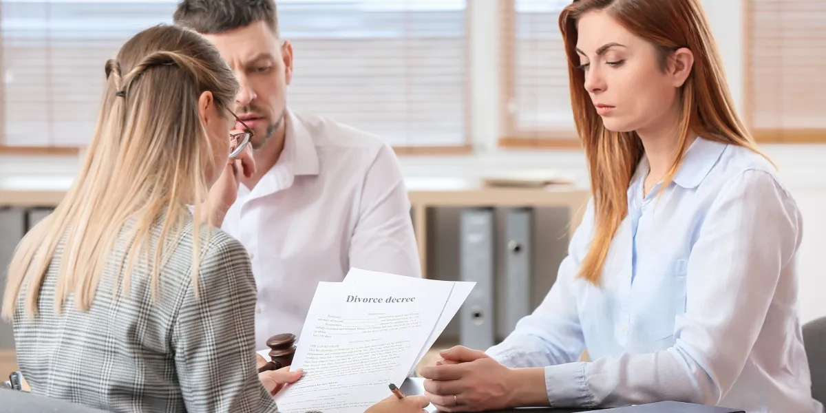 lady and man and mediator at mediation