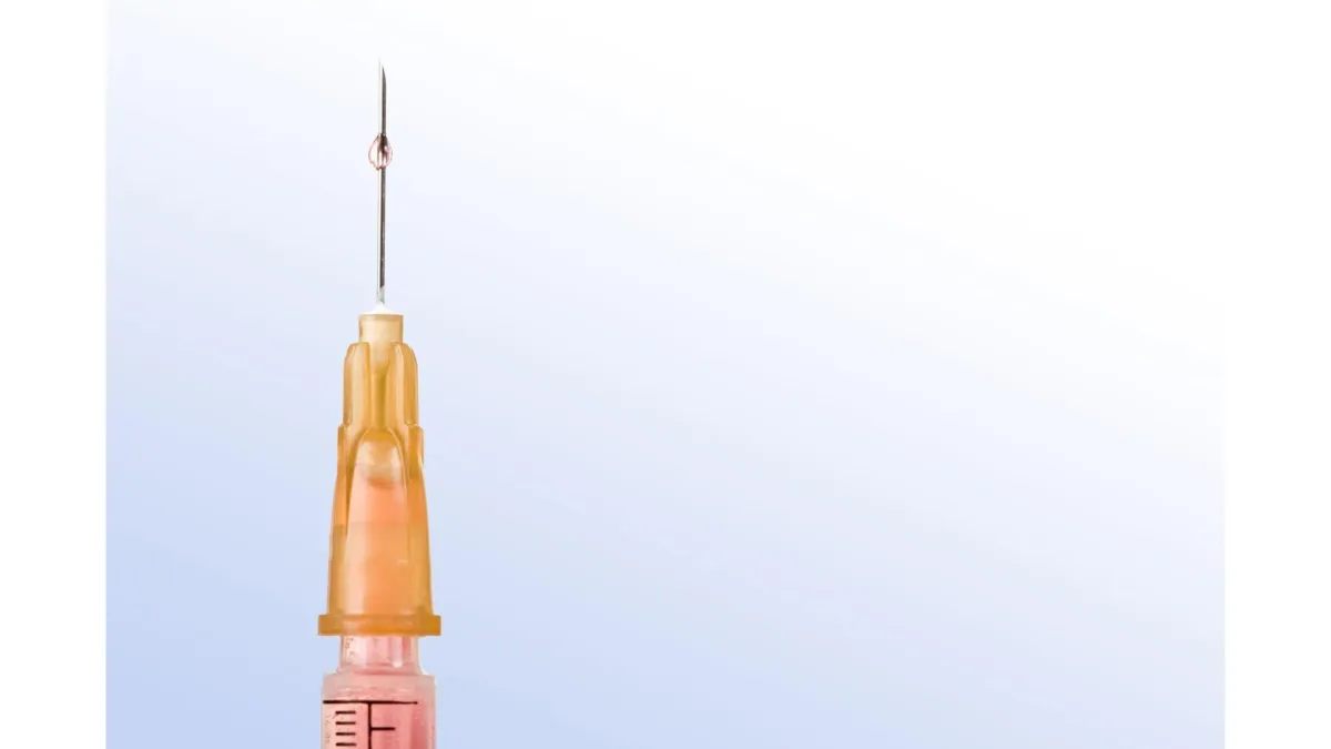 a close up of a needle on a syringe