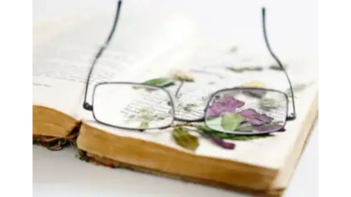 eyeglasses on a book