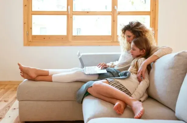 mother child on couch for life insurance
