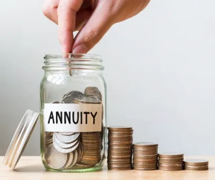 hand putting money in annuity jar