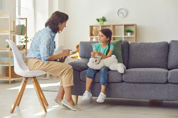 A professional supporting a child