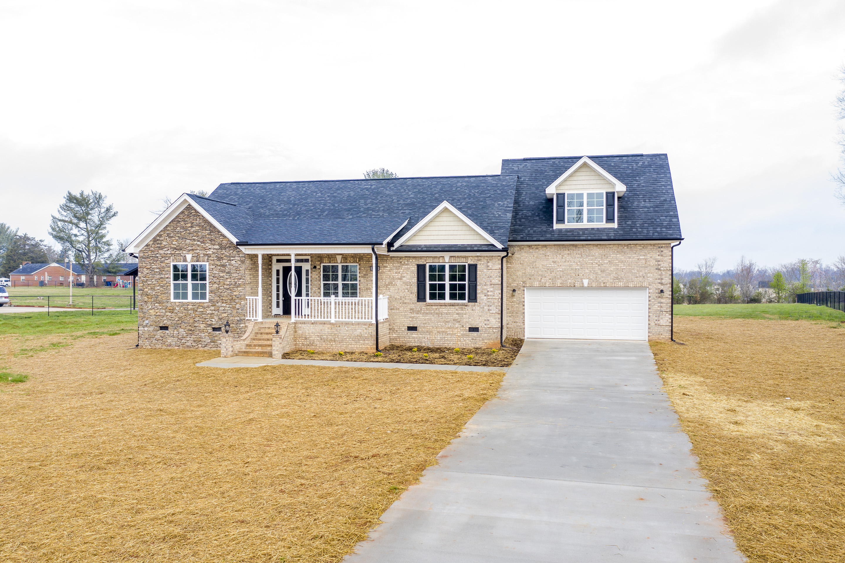 New home construction with bonus room over garage built by Neta Homes in Kernersville, NC