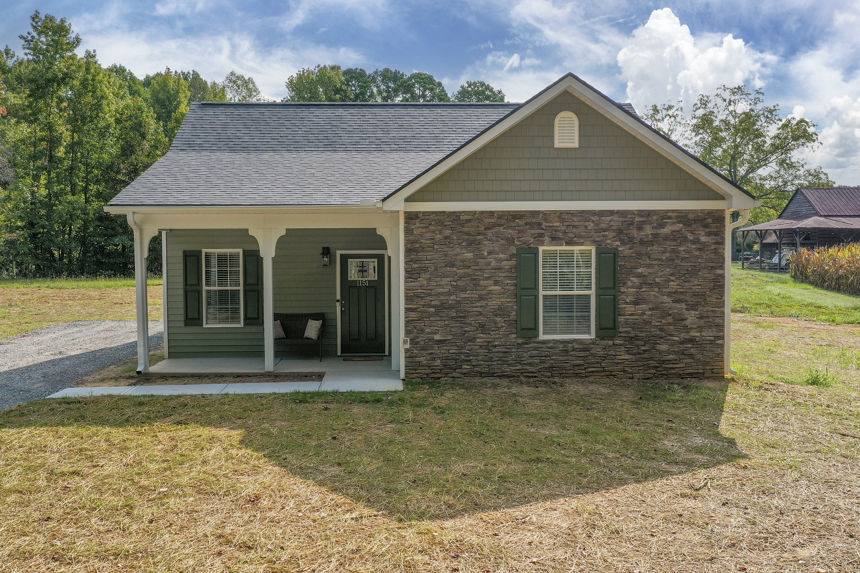Front view of a one-story 3-bedroom, 2-bath new construction home with vinyl siding in Lexington, NC (zip 27292).