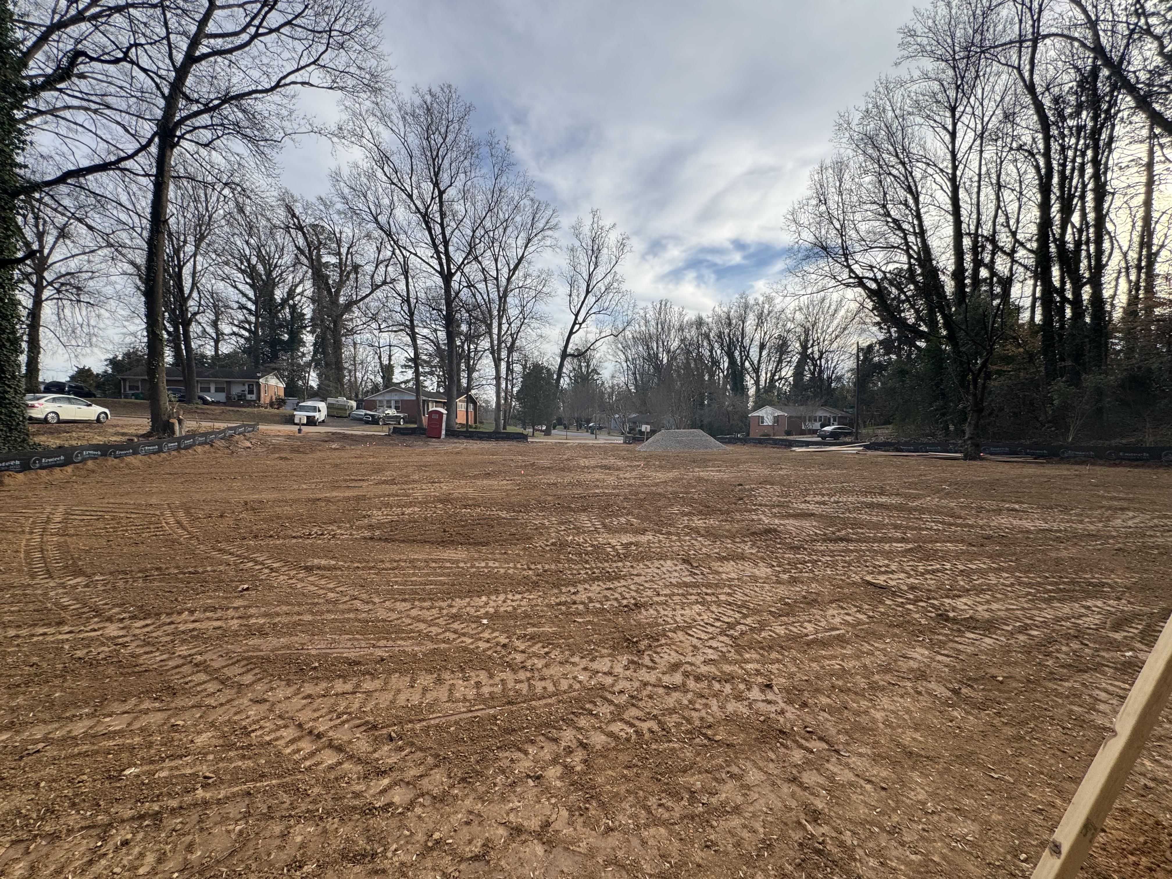 Cleared quadplex construction site in Charlotte, North Carolina 28262 prepared by Neta Homes for new multifamily foundation development