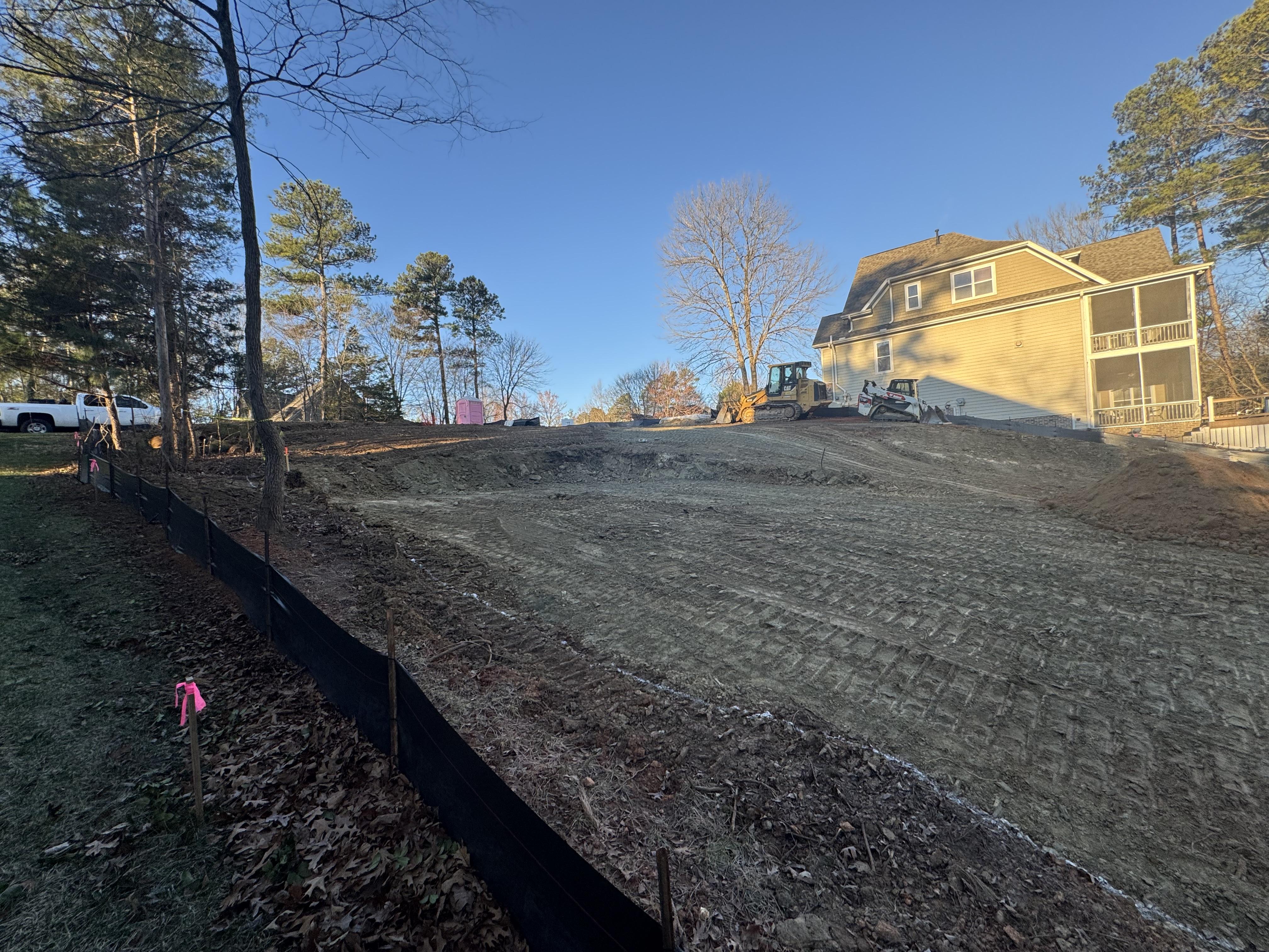 Foundation construction starting on a two-level brick home in Lake Wylie, South Carolina, built by Neta Homes with reinforced design for local soil conditions.