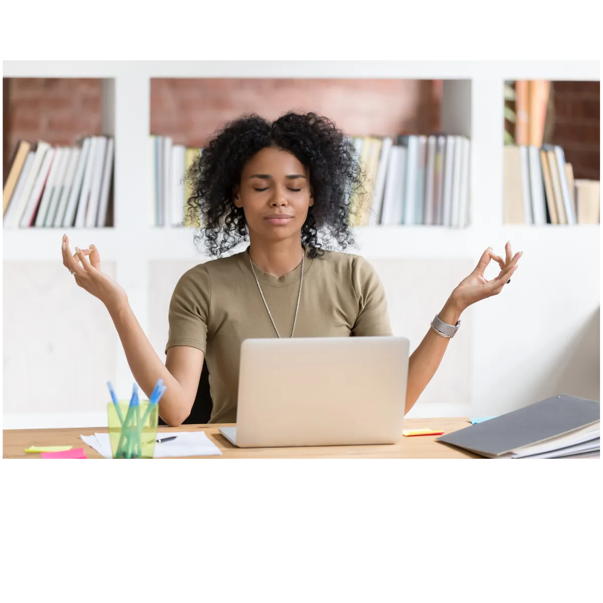 woman meditating at the office
