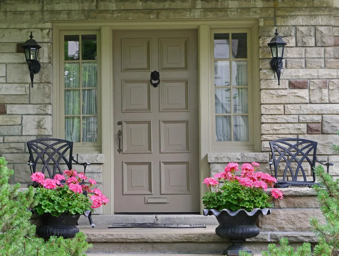 Front door of house flower pot Realtor Sheila Howell