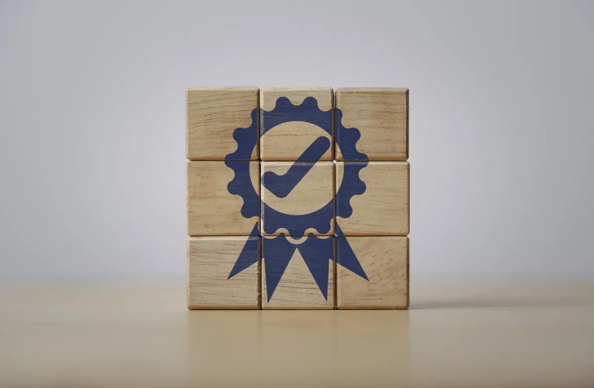 Wooden Blocks with Checkmark Badge for Quality and Best Service
